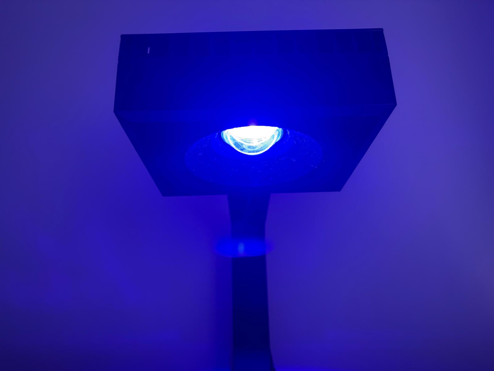 The illuminated LED lens underneath the Red Sea ReefLED 90